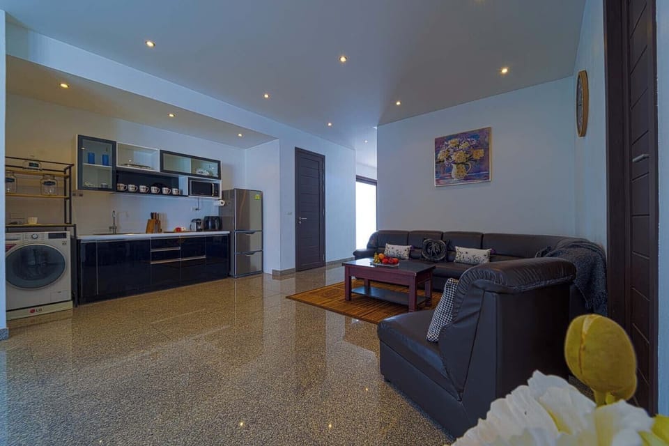 Executive Villa, Pool View | Living area | Flat-screen TV