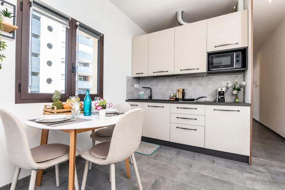 Family Studio, Balcony (Always Traveling Near The City Center) | Private kitchen