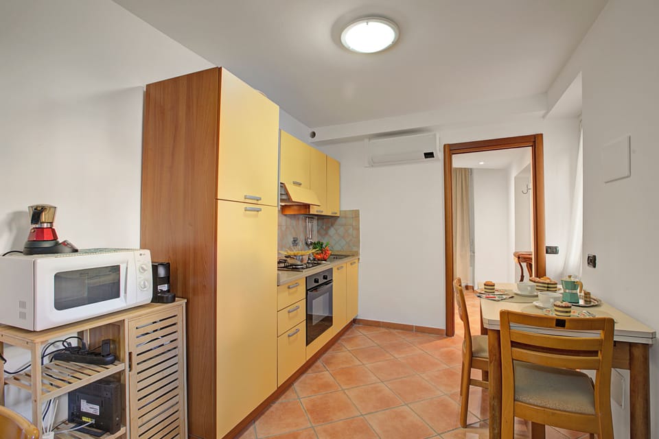 Family Apartment, 2 Bedrooms, Microwave (Queen Elena Home Centro Sanremo) | Private kitchen | Fridge, microwave, oven, stovetop
