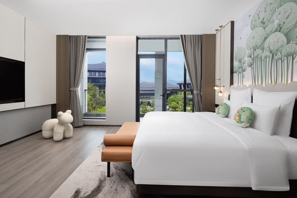 Deluxe Suite, Multiple Beds (Family Theme) | Premium bedding, down comforters, free minibar items, in-room safe