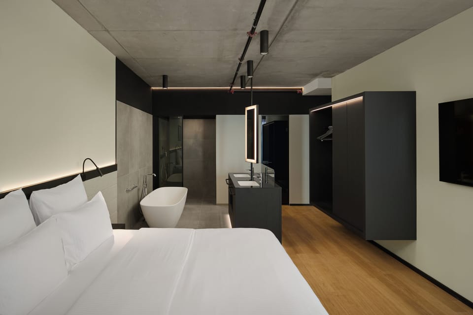 Superior Suite, 1 King Bed | Bathroom | Shower, designer toiletries, hair dryer, bathrobes