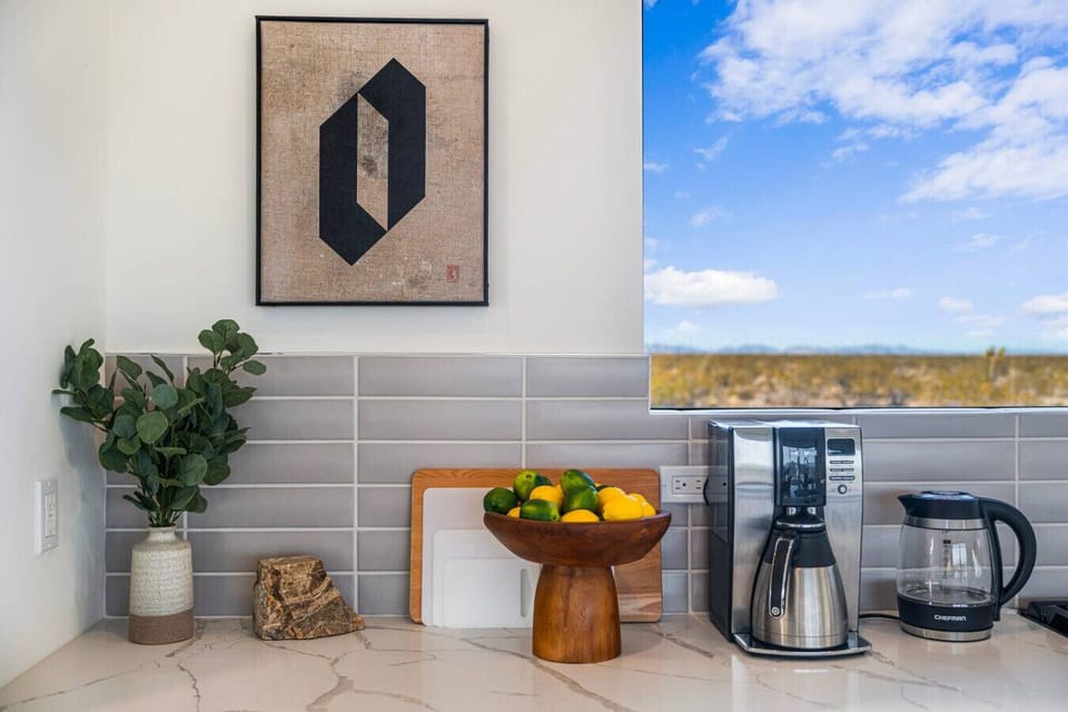 Kitchen: Enjoy stunning desert views while cooking in this stylish, well-equipped space!