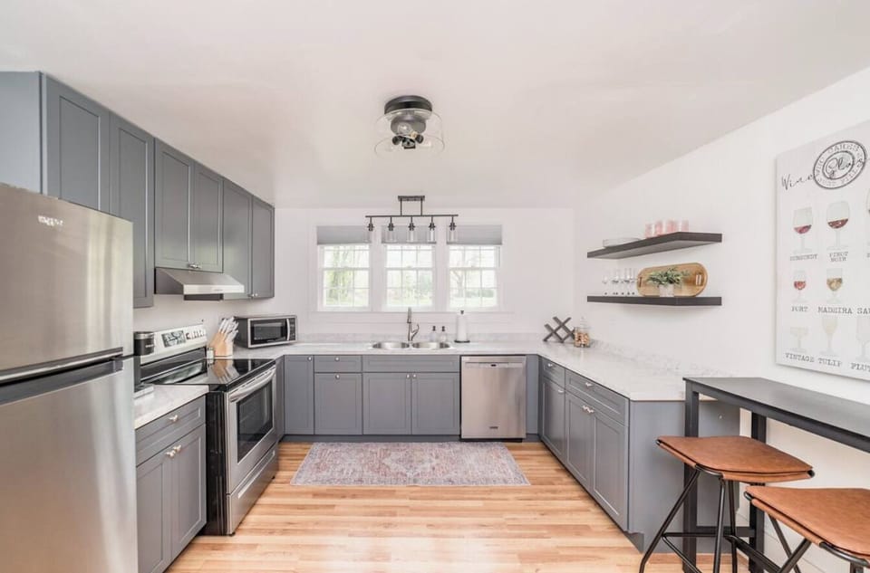 Fully equipped kitchen includes stainless appliances
