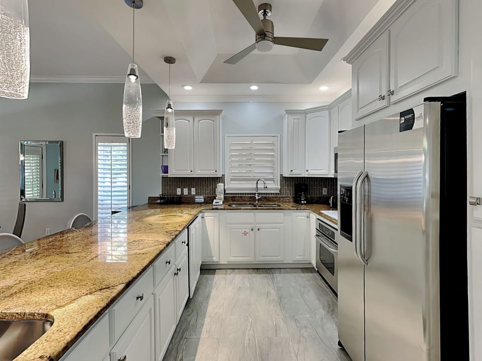 House, Multiple Beds, Patio (Caribe by the Sea) | Private kitchen | Fridge, microwave, oven, stovetop