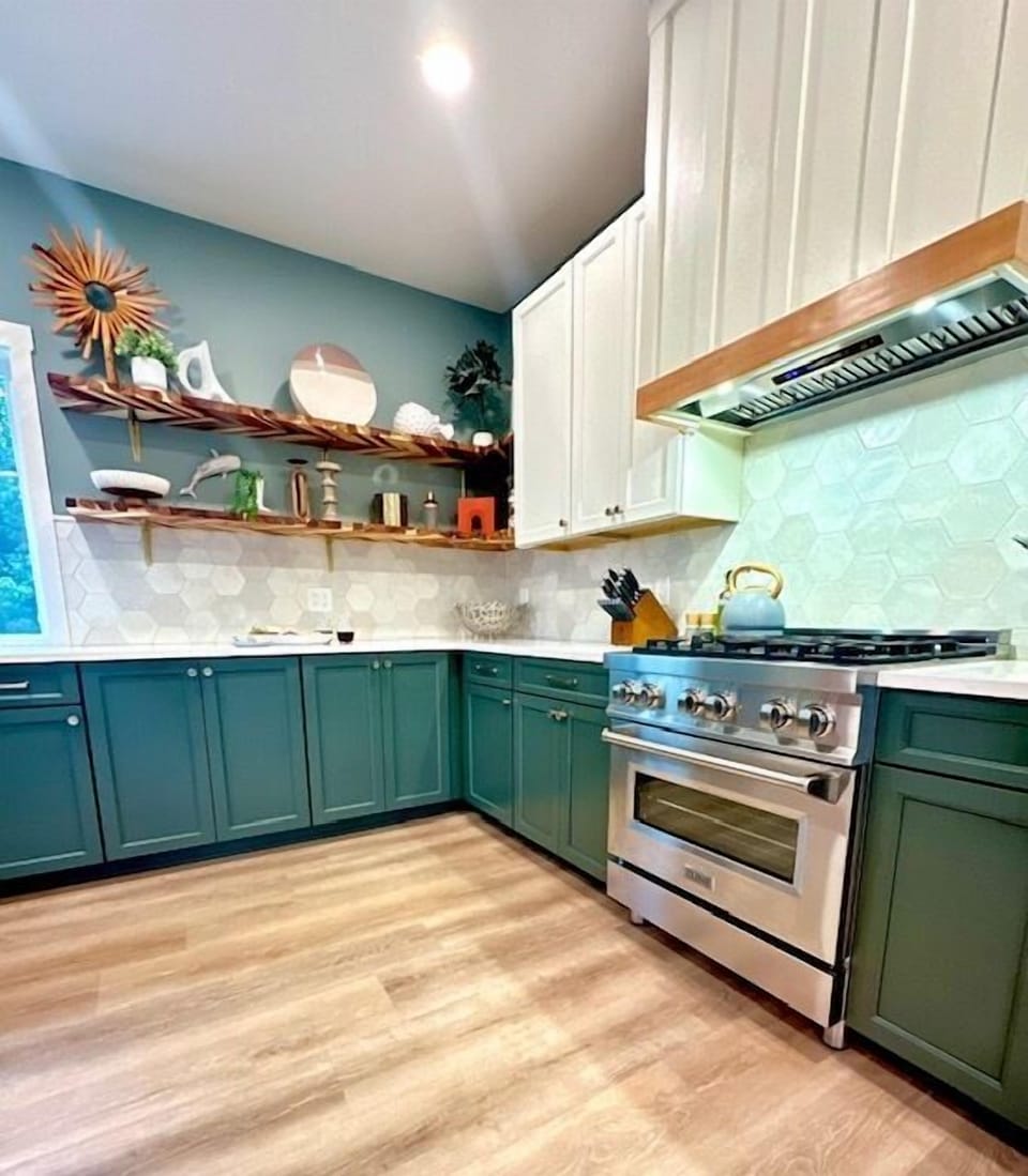 Open-concept kitchen with full amenities and appliances.