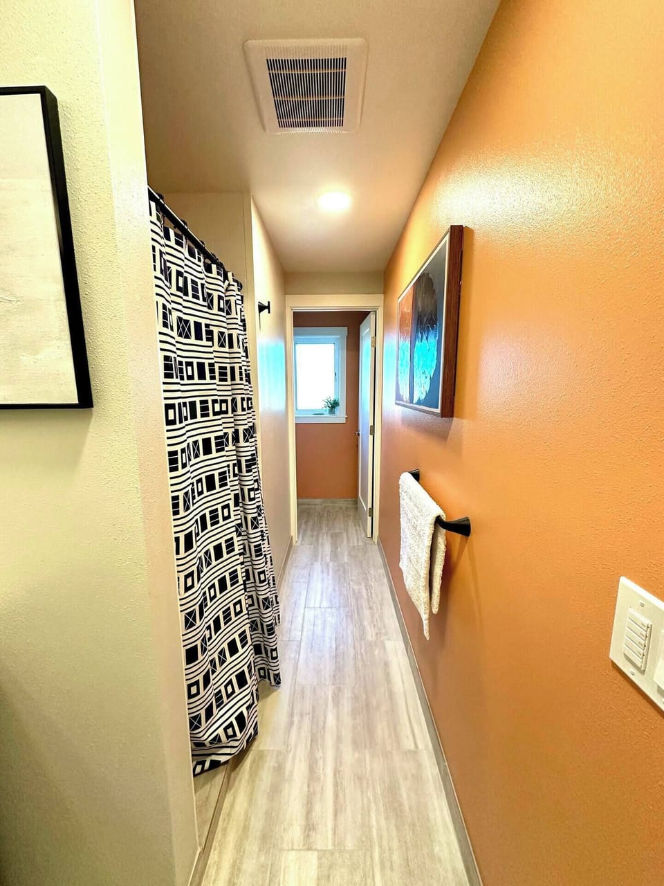 Hall bath with heated tile floors, with custom shower and wonderful toiletries.