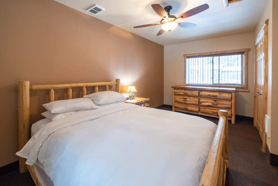 Northern Michigan themed furniture. Log queen sized bed, log dresser.