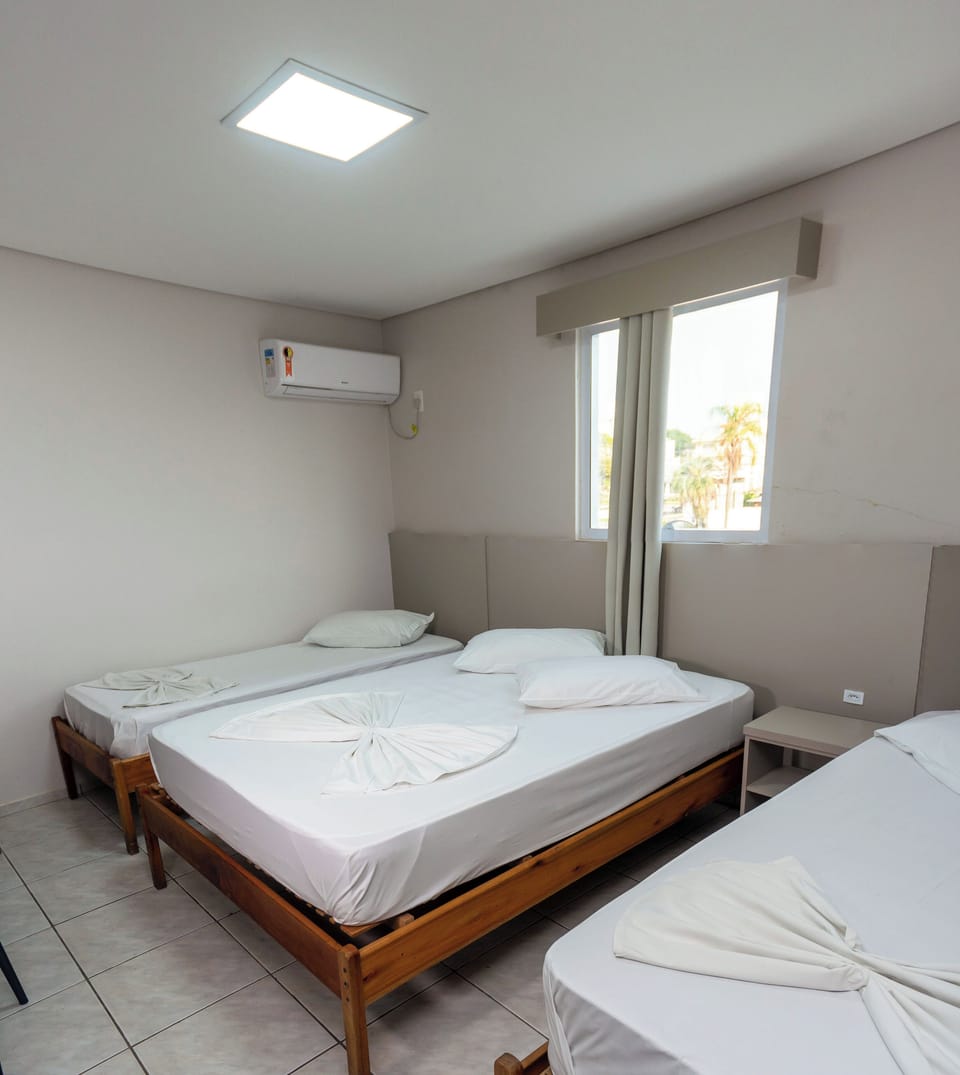 Economy Quadruple Room | Desk, laptop workspace, iron/ironing board, free WiFi