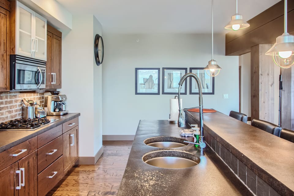 Condo | Private kitchen | Coffee/tea maker, full-size fridge, microwave, oven