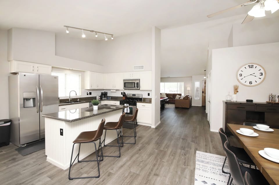 Bright open kitchen and dinning room with plenty of space for everyone.