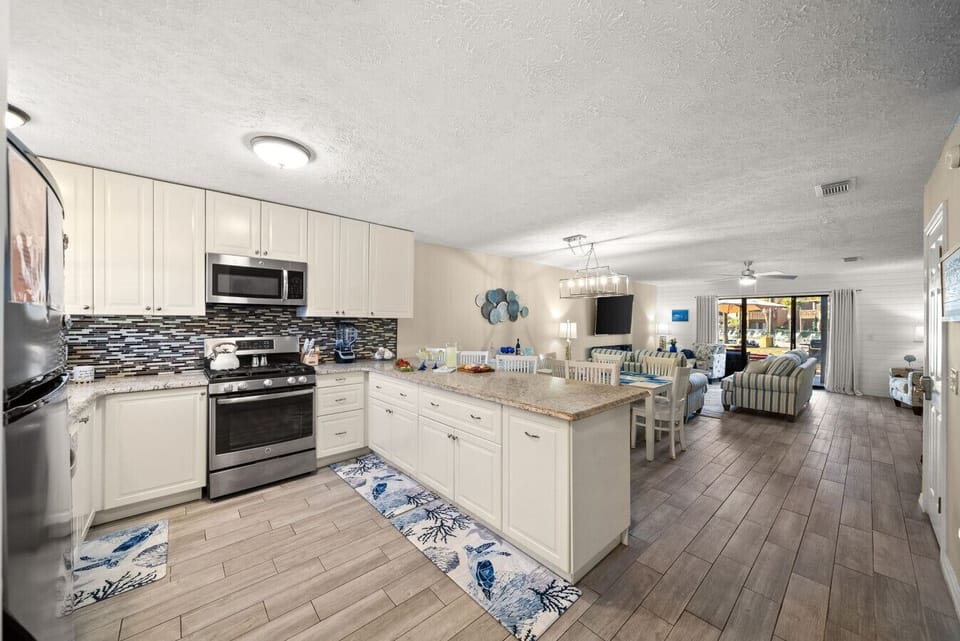 Fully Stocked Kitchen with Stainless Steel Appliances, Keurig Coffee Maker & Island Bar Seating