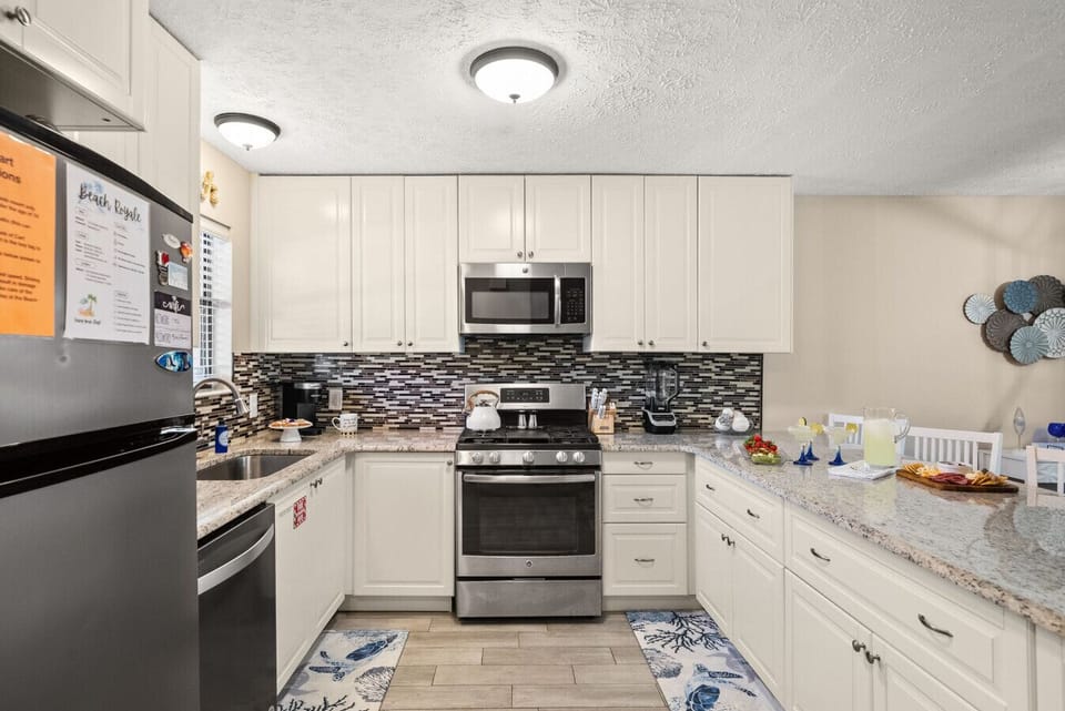 Fully Stocked Kitchen with Stainless Steel Appliances, Keurig Coffee Maker & Island Bar Seating