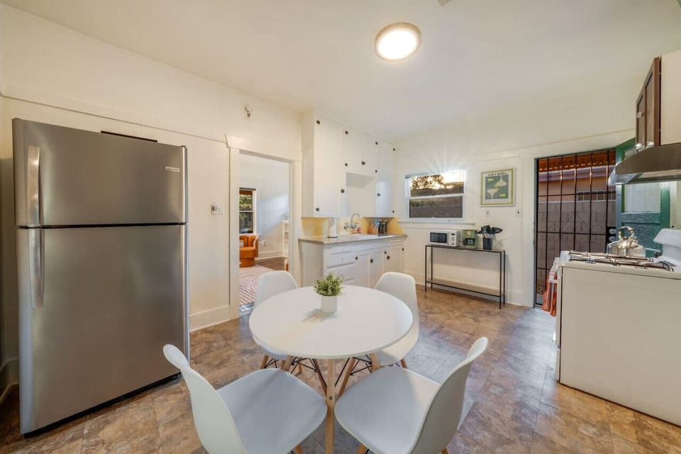 Eat-in kitchen`s dining area with seating for four