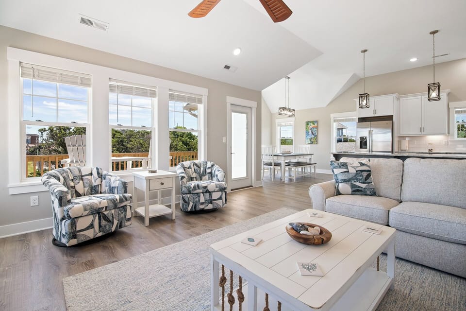 Relax in front of the flat screen TV in the spacious Living Area.