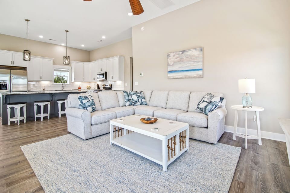 Relax in front of the flat screen TV in the spacious Living Area.