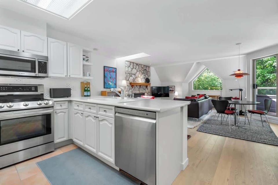 - Open kitchen and living design blending comfort and convenience  
- Large windows fill the space with bright Whistler sunlight  
- Perfect for entertaining or enjoying a relaxing mountain getaway  
