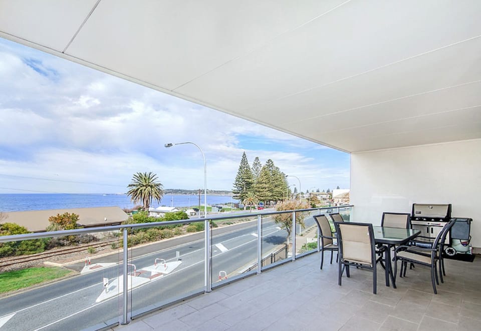 Commanding, picturesque views of the Southern Ocean and Granite Island from the private balcony.