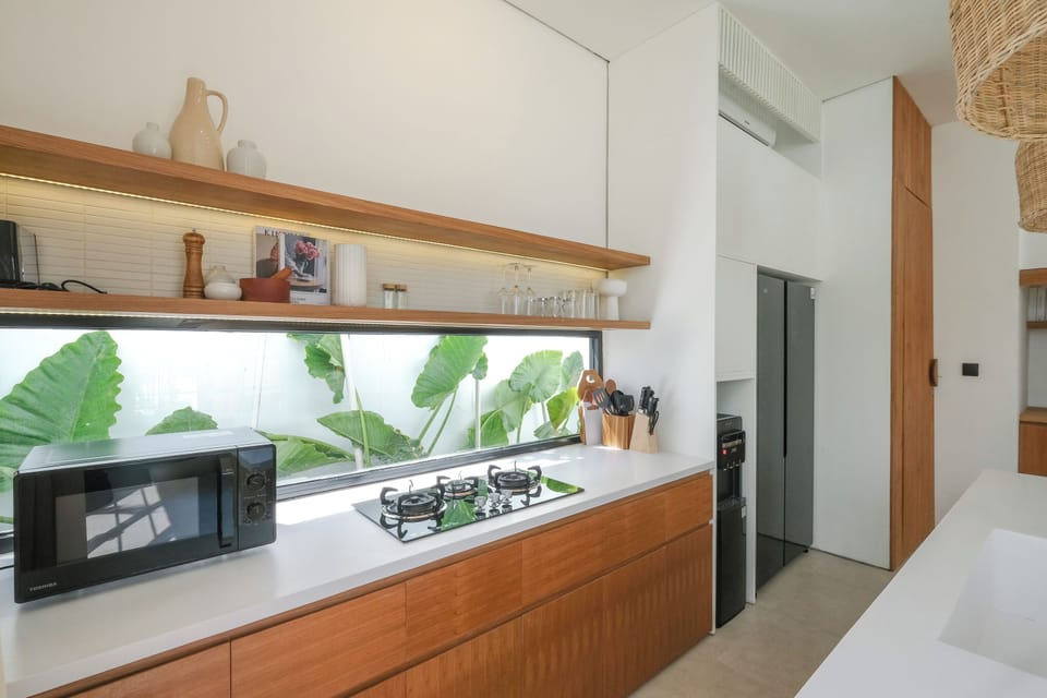 Design Villa | Private kitchen | Fridge, microwave, stovetop, cookware/dishes/utensils