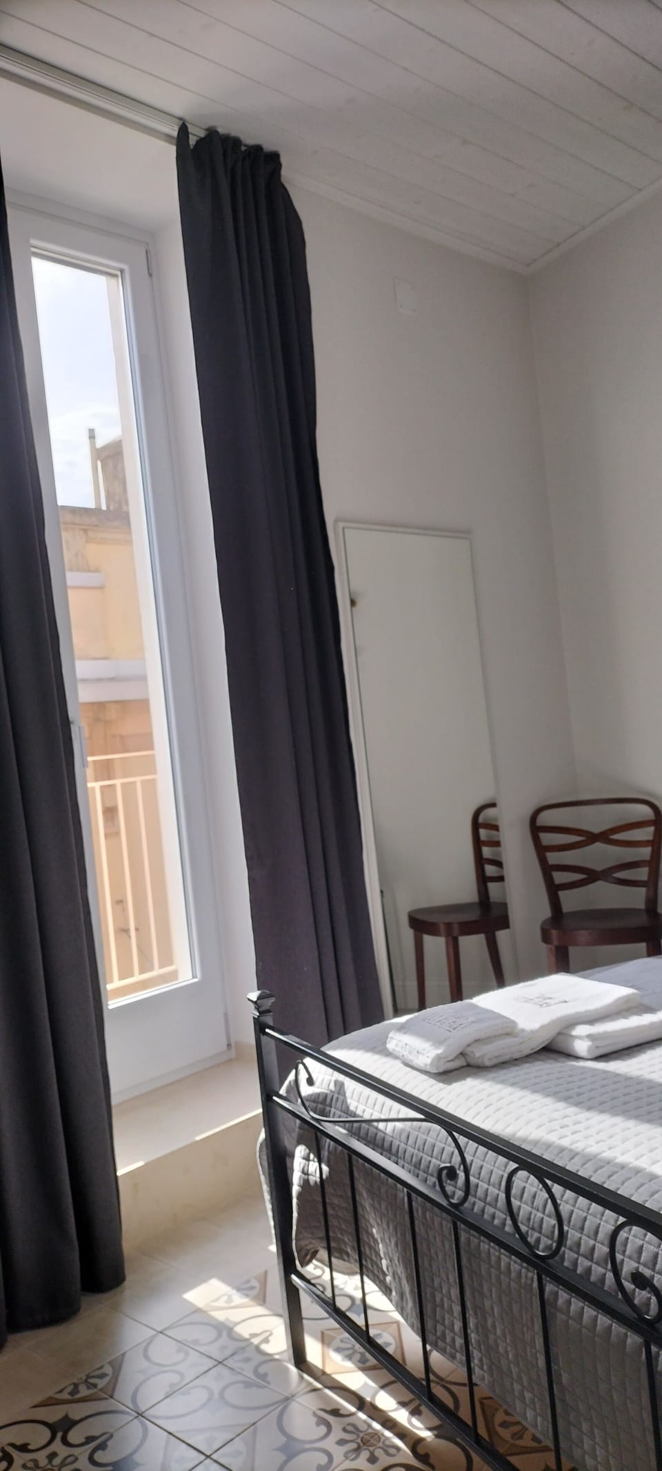 Family Quadruple Room, City View | Down comforters, free minibar items, individually decorated