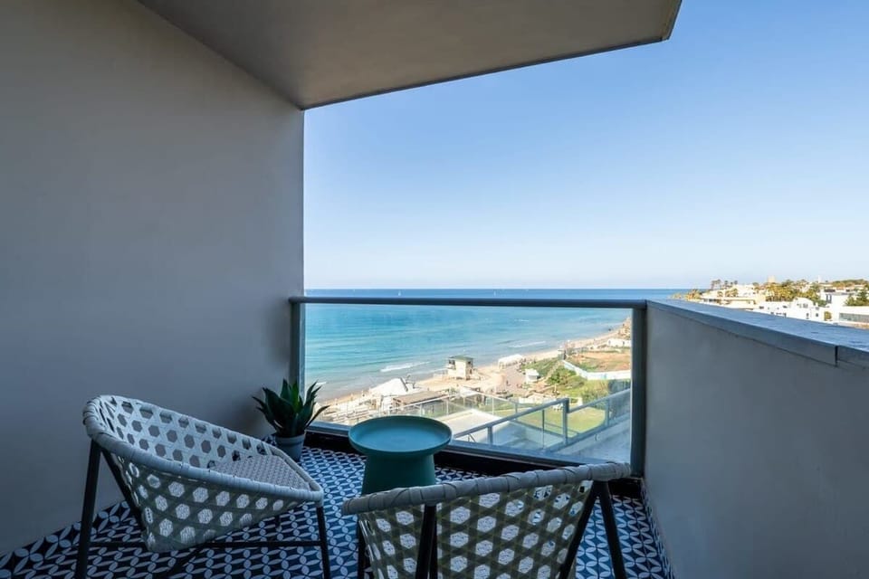 Enjoy the mesmerizing view & fantastic breeze of the Mediterranean Sea on the lovely balcony.