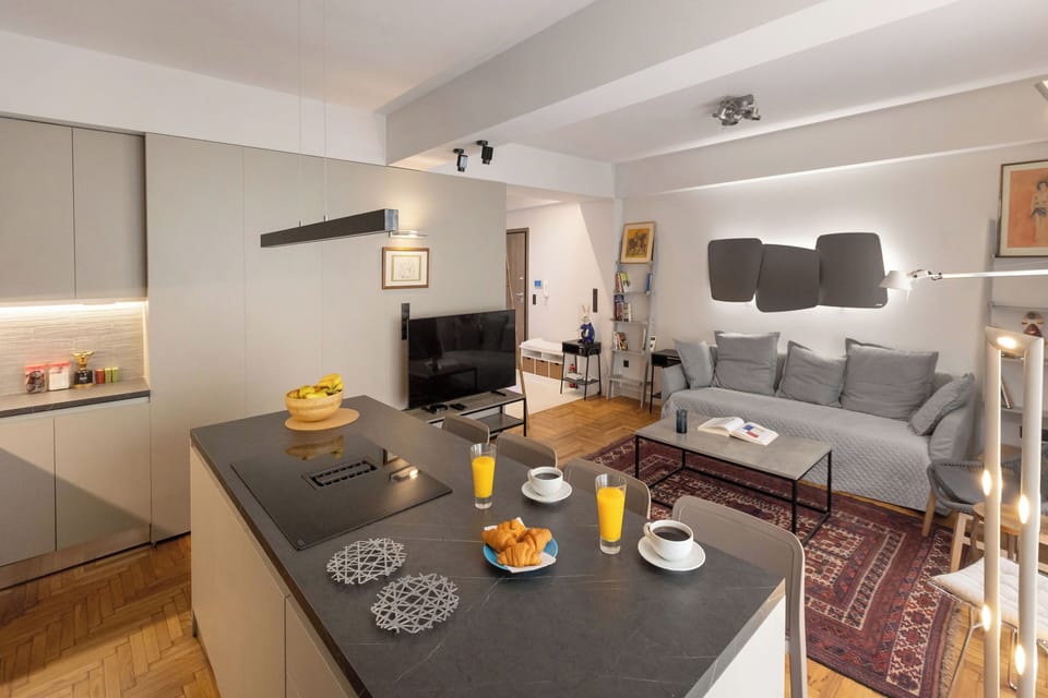 Design Apartment, 2 Bedrooms | Living area | 55-inch Smart TV with digital channels