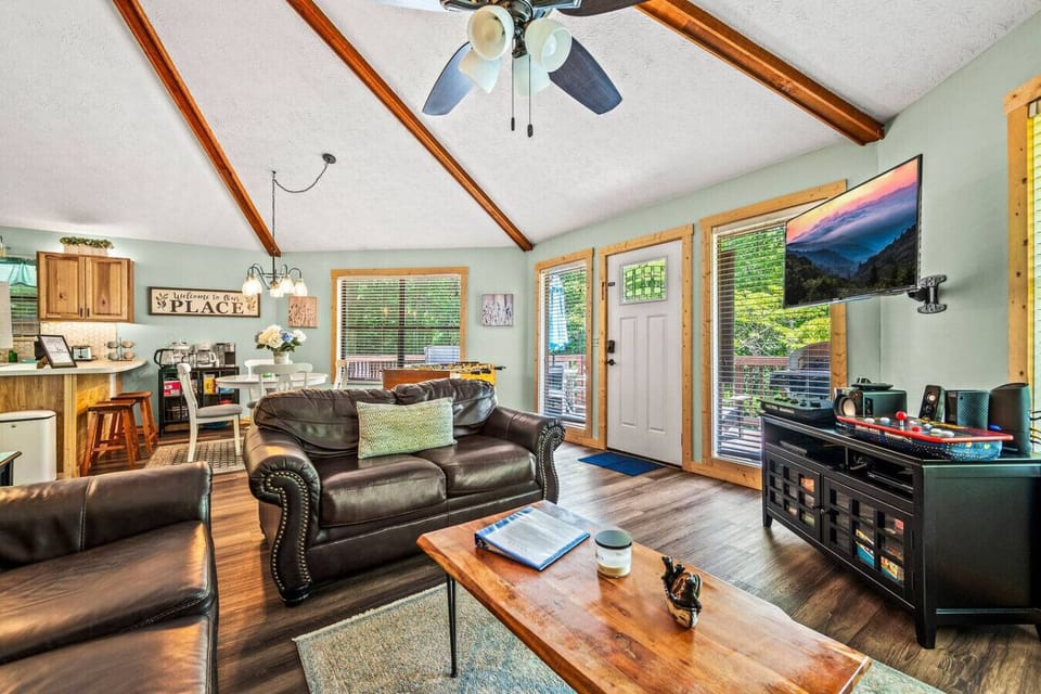 Open floorplan cabin has the entire living area conveniently in one space so your group can spend time together.