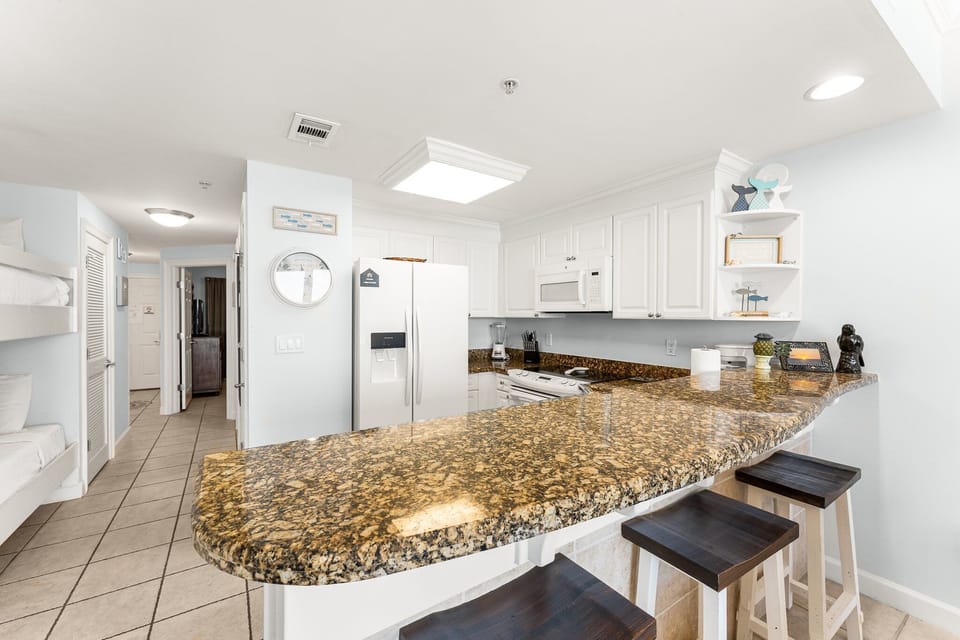 The fully equipped kitchen has everything you need to prepare meals for family and friends.