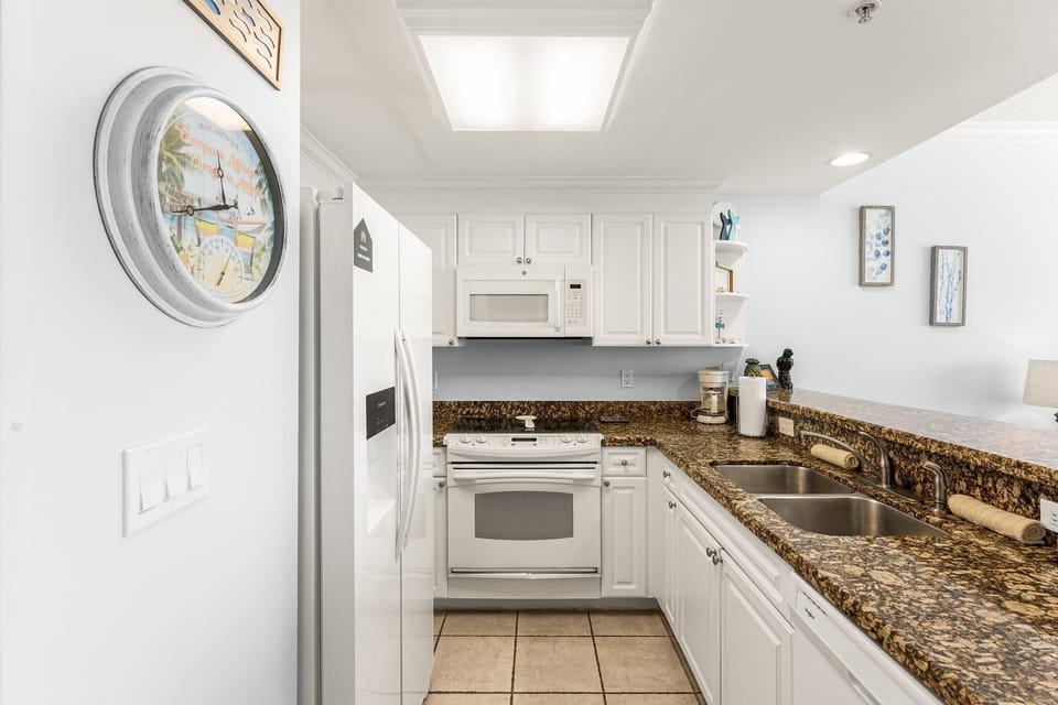 The fully equipped kitchen has everything you need to prepare meals for family and friends.