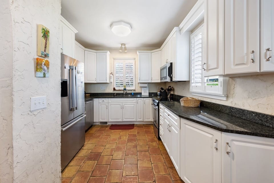 Condo, 4 Bedrooms | Private kitchen | Coffee/tea maker, fridge, oven, toaster