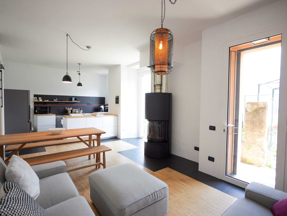 Apartment, Balcony, Lake View | Living area | 30-inch TV with digital channels