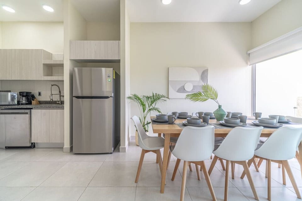 Open-concept dining and kitchen area, perfect for gathering and entertaining