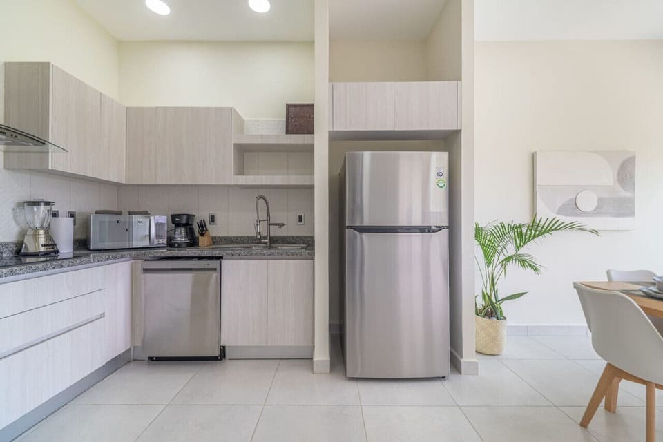 Fully equipped kitchen with modern appliances for all your cooking needs