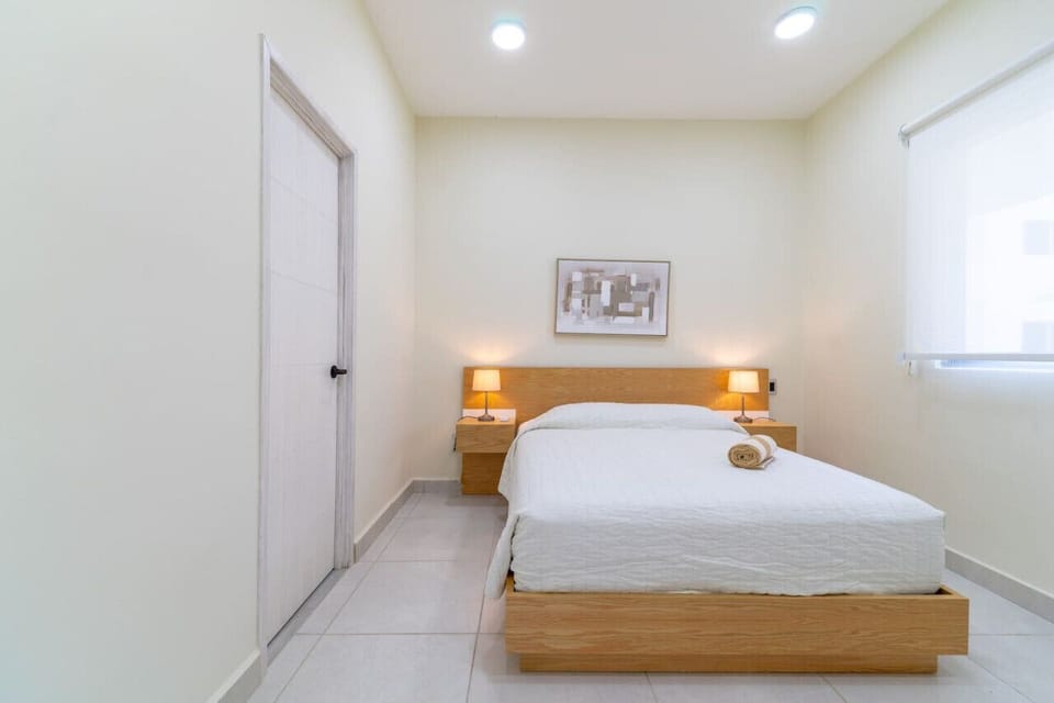 Enjoy a restful night in our tranquil and comfortable bedroom