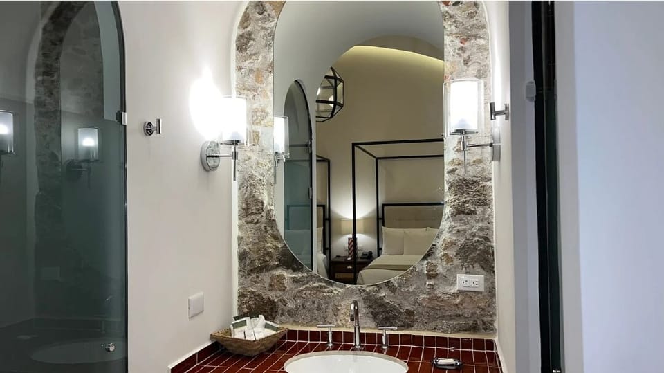 Shower, rainfall showerhead, towels, soap