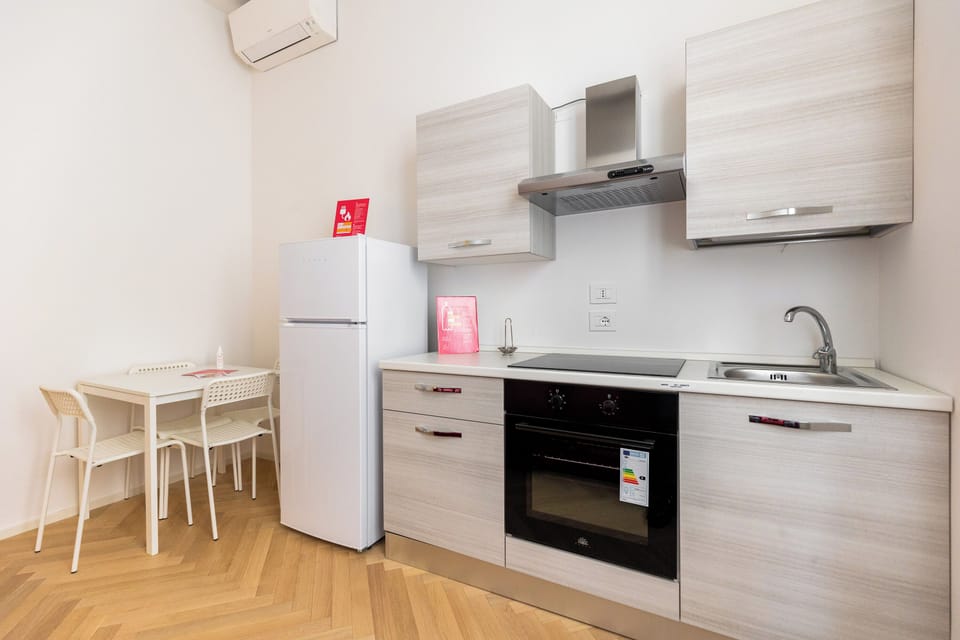 Apartment | Private kitchen | Cookware/dishes/utensils, freezer, dining tables