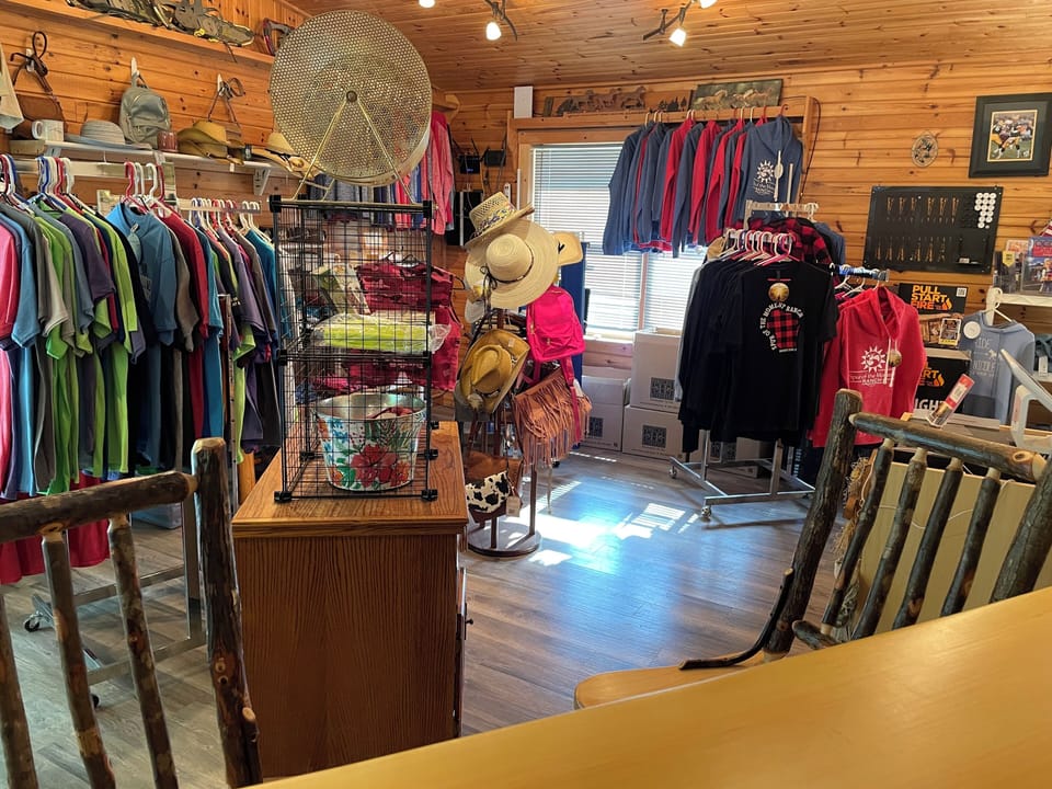 Camp Store

Be sure to check out the camp store while you are on the Ranch!  T-shirts, sweatshirts, coffee mugs, games for the kids, and so many other items can be found browsing the camp store.  Forgot an essential, we probably have it! 