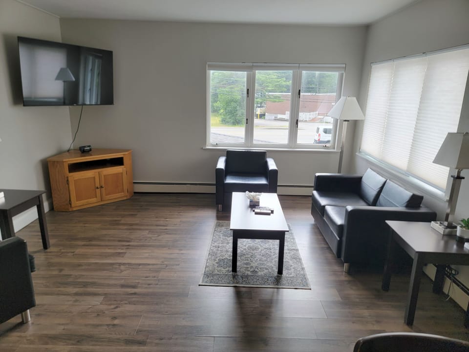 Apartment, 2 Double Beds | Living area | 32-inch LCD TV with cable channels, TV