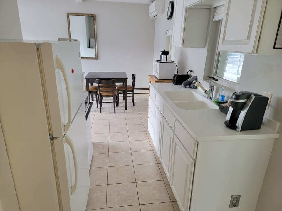 Apartment, 2 Double Beds | Private kitchen | Coffee/tea maker, mini-fridge