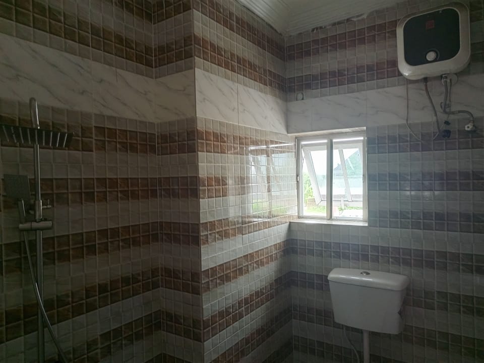 Superior Single Room | Bathroom | Shower, slippers, towels, soap