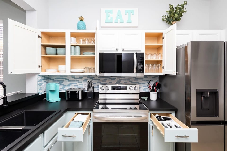 Townhome, Multiple Beds, Pool Access, Garden View (Just Beachy at Regal Palms) | Private kitchen | Coffee/tea maker