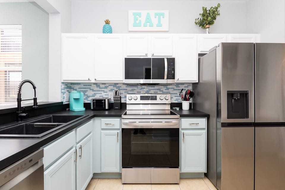 Townhome, Multiple Beds, Pool Access, Garden View (Just Beachy at Regal Palms) | Private kitchen | Coffee/tea maker