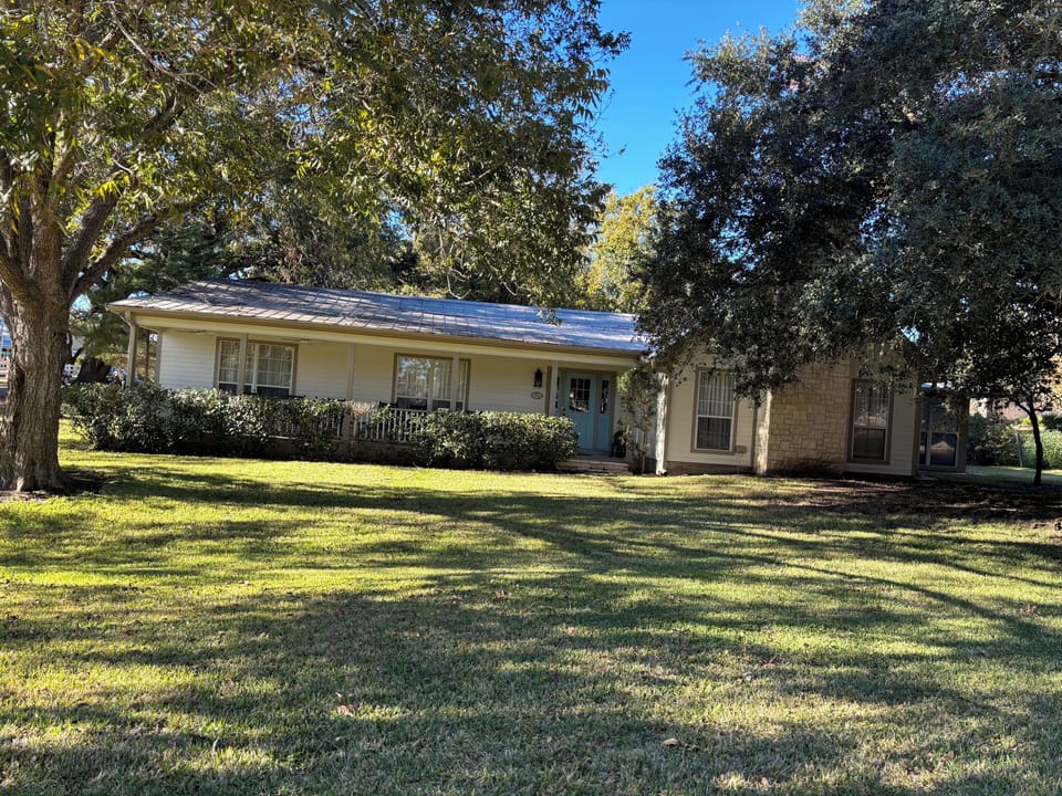 Your new home away from home! Enjoy sunsets on the porch in rocking chairs.