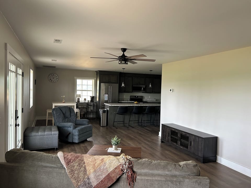 Main living area and kitchen with large island is open floor plan.