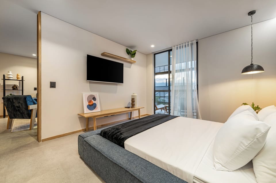 Deluxe Apartment, Balcony, City View | 1 bedroom, in-room safe, blackout drapes, iron/ironing board