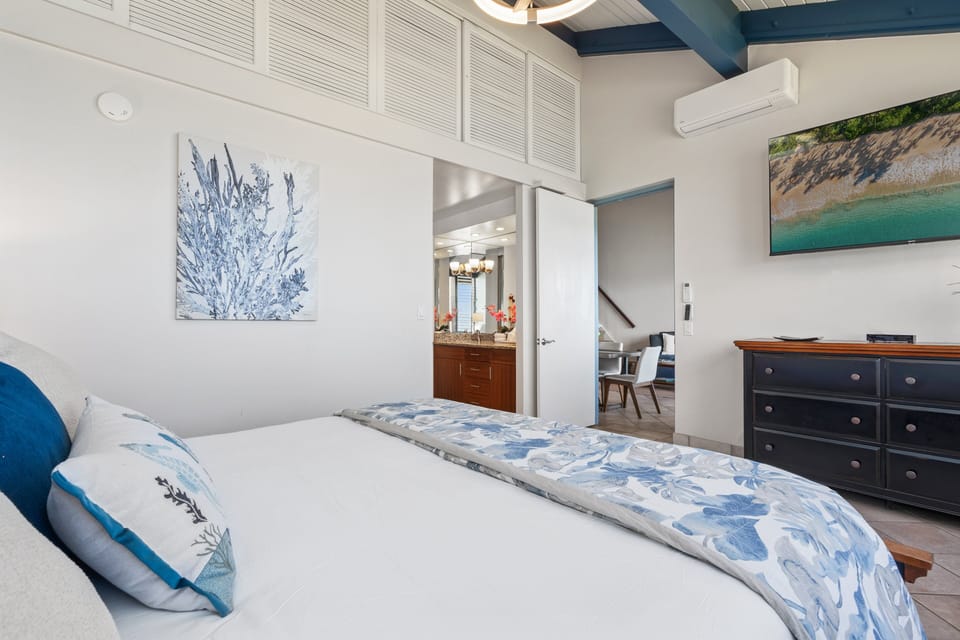 Thoughtfully designed for comfort, this bedroom combines island-inspired décor with a bright, open feel.