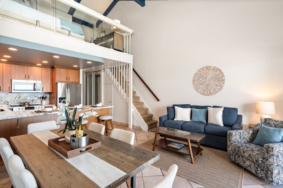 Spacious great room with soaring ceilings, loft accommodations, and an open layout designed for gathering and relaxation.