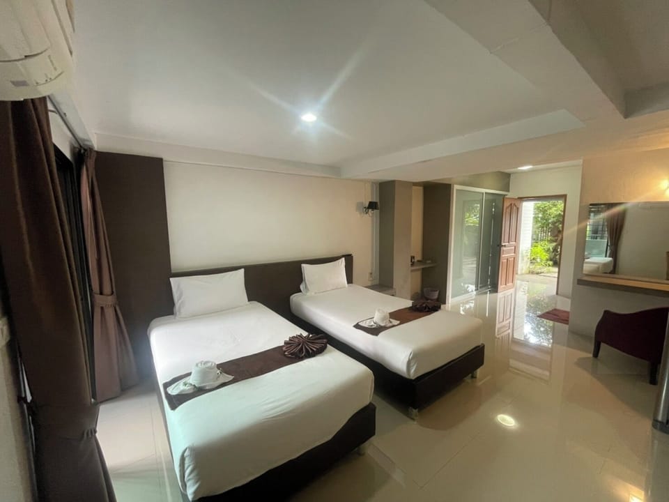 Basic Room, Non Smoking | Desk, laptop workspace, WiFi (free), individually decorated