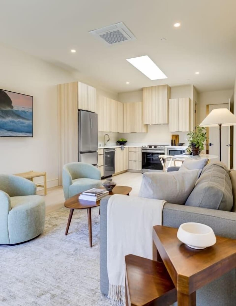 Seating area with sofa and lounge chairs