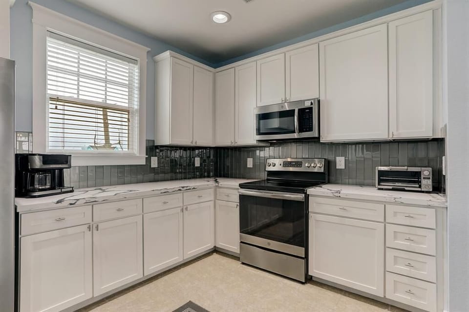 Lots of cabinet and counter space.