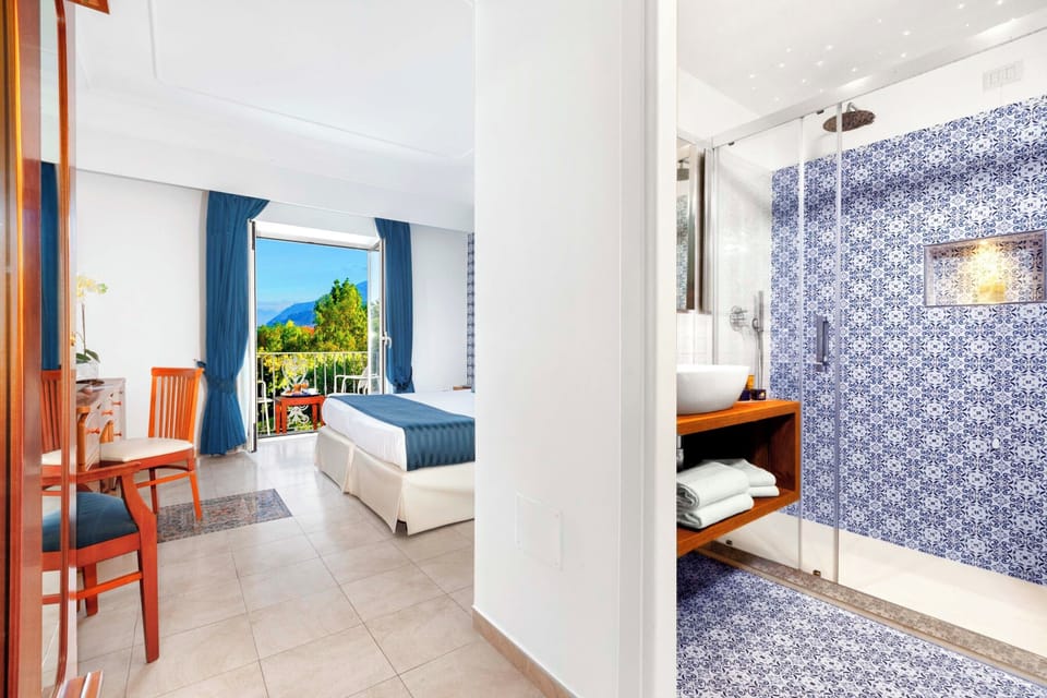 Classic Room, Balcony, Sea View | Hypo-allergenic bedding, down comforters, minibar, in-room safe